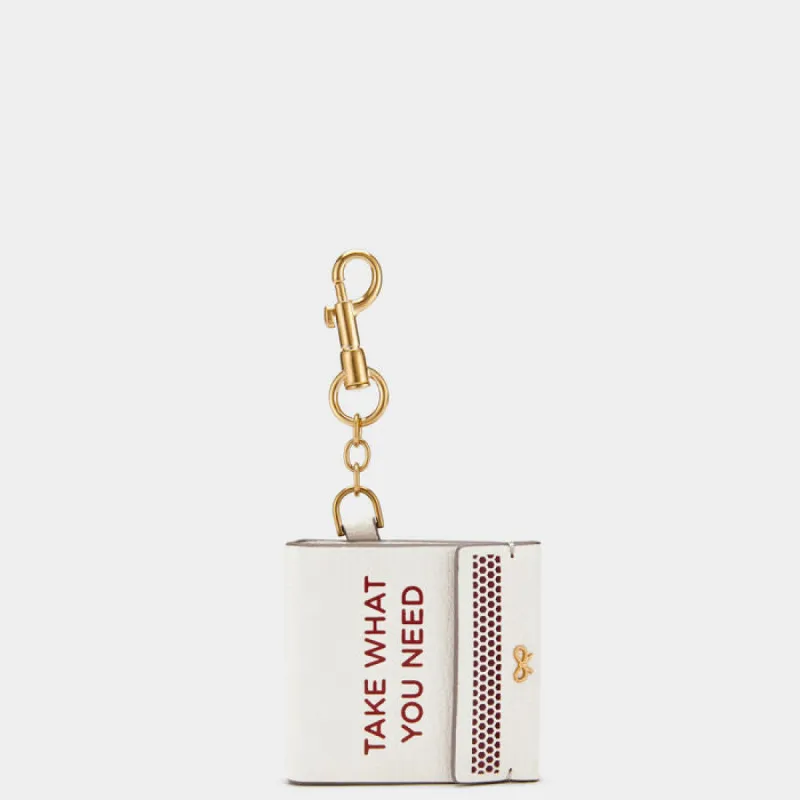 Match Book Charm sold by Anya Hindmarch