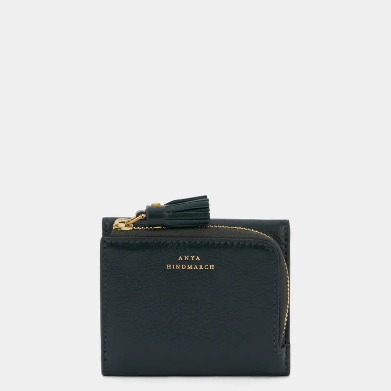 Peeping Eyes Mini Trifold Wallet sold by Anya Hindmarch