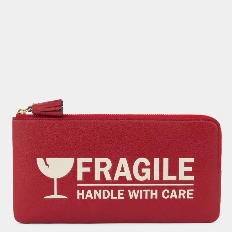 Fragile Zip Loose Pocket sold by Anya Hindmarch