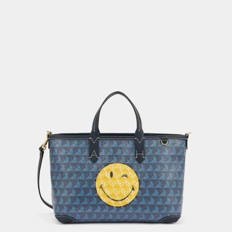 I am a Plastic Bag XS Wink Tote sold by Anya Hindmarch