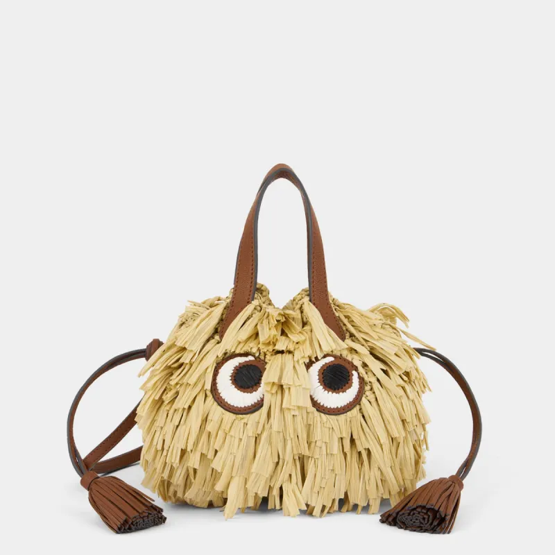 Shag Raffia Eyes Small Drawstring Cross-body Tote sold by Anya Hindmarch