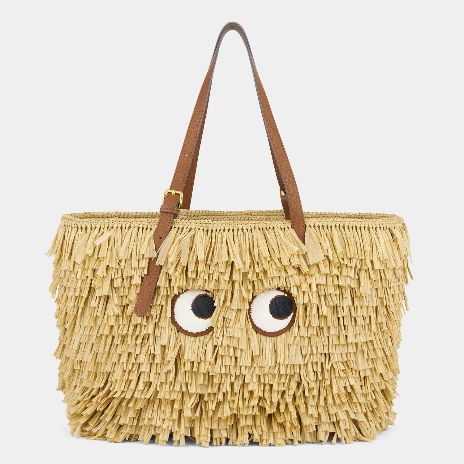 E/W Shag Raffia Eyes Tote sold by Anya Hindmarch