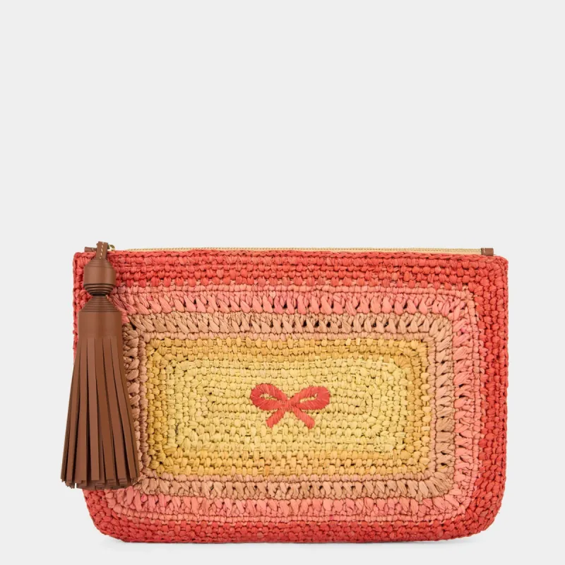 Raffia Tassel Bow Clutch sold by Anya Hindmarch