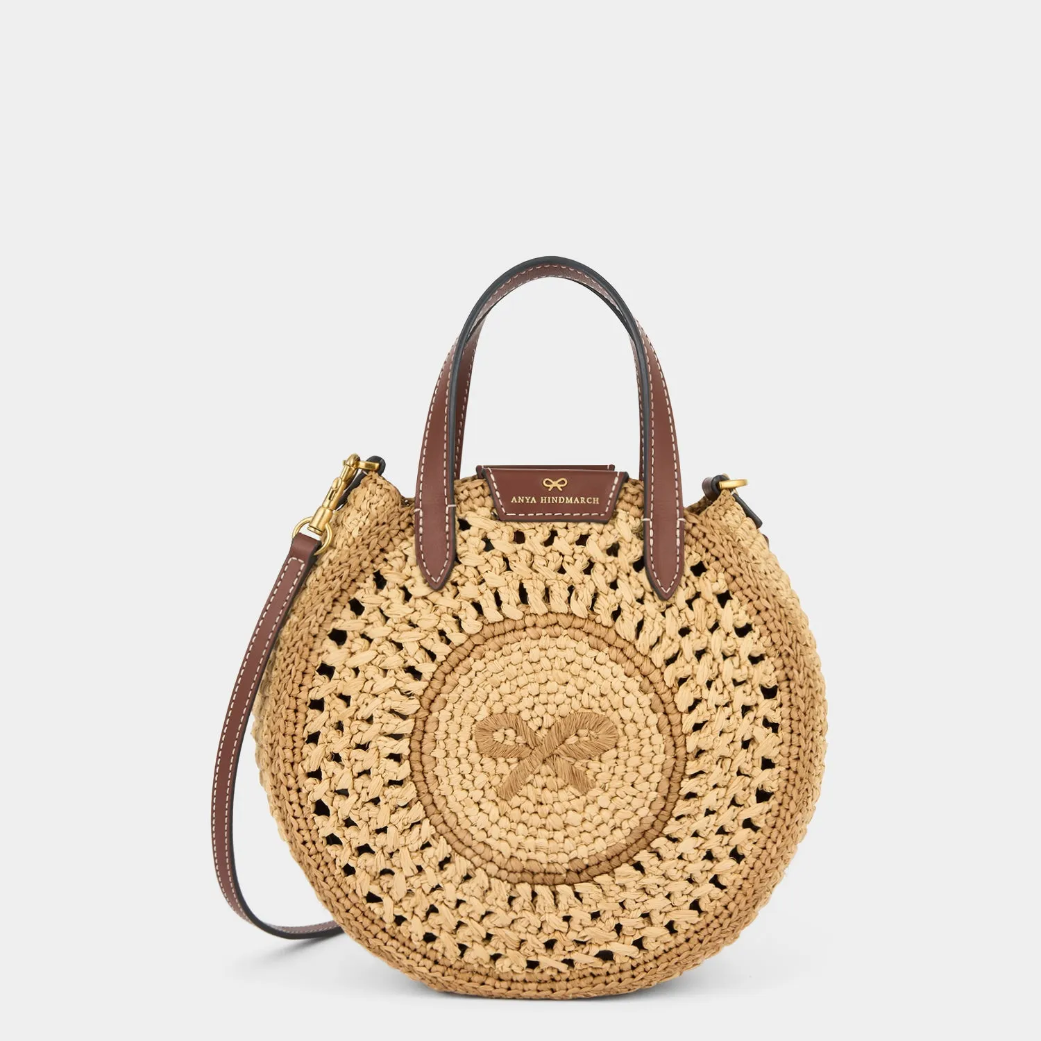 Raffia Small Round Bow Cross-body Tote sold by Anya Hindmarch
