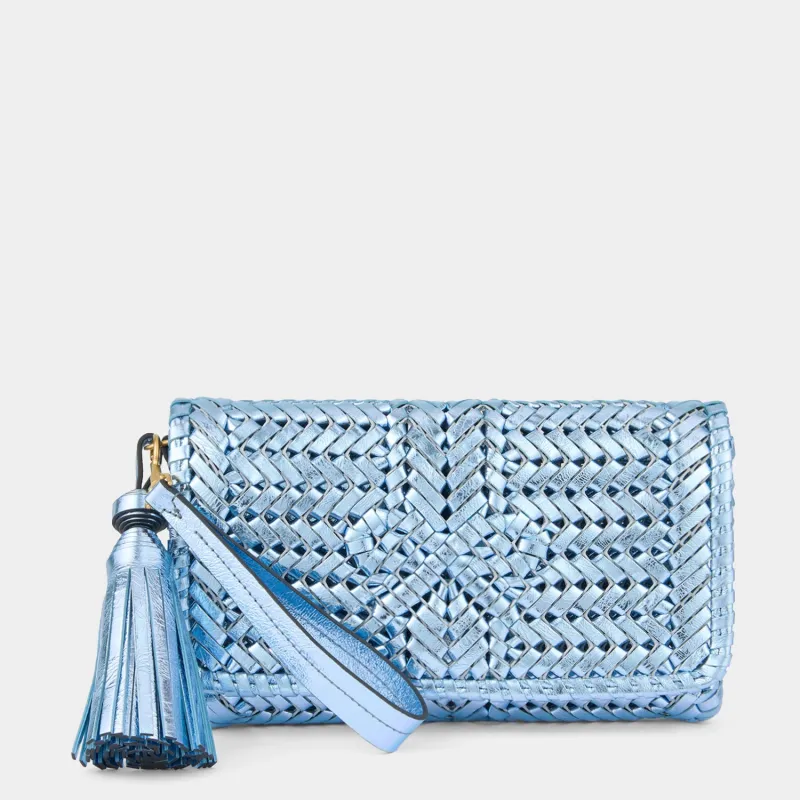 Neeson Tassel Clutch sold by Anya Hindmarch