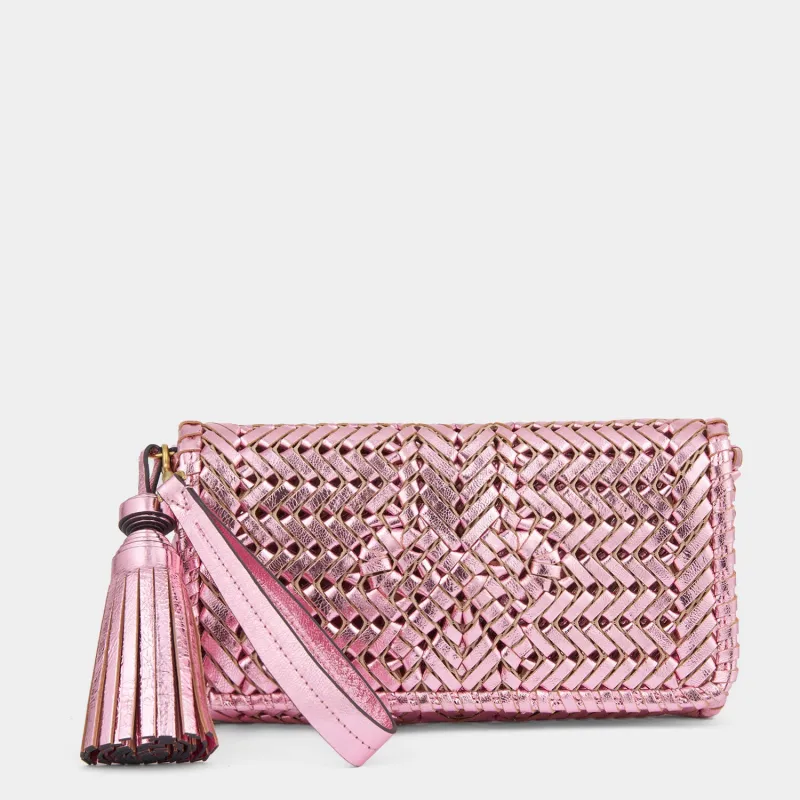 Neeson Tassel Clutch sold by Anya Hindmarch