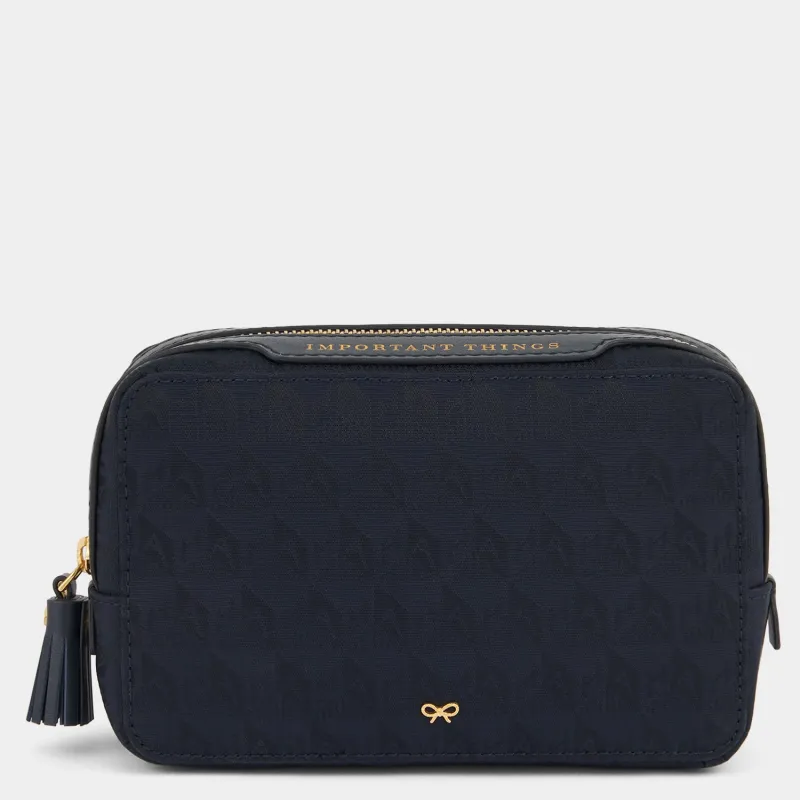 Logo Important Things Pouch sold by Anya Hindmarch