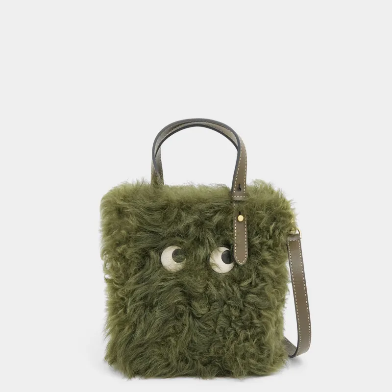 N/S Mini Eyes Shearling Tote sold by Anya Hindmarch