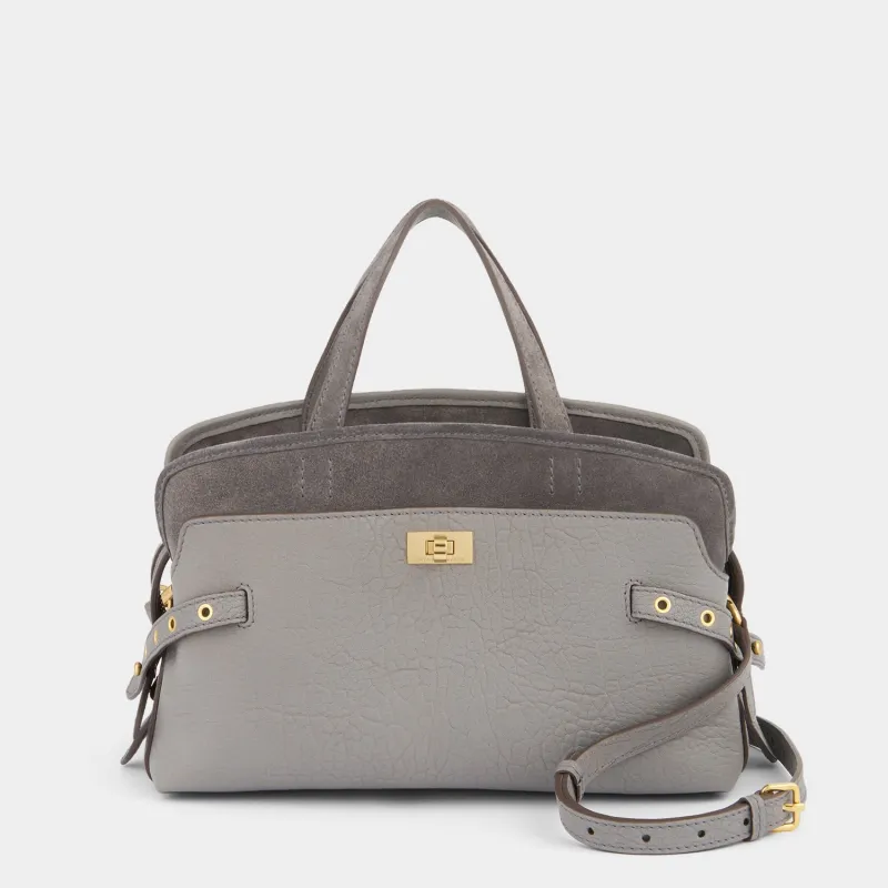 Wilson Eyelet Cross-body made by Anya Hindmarch