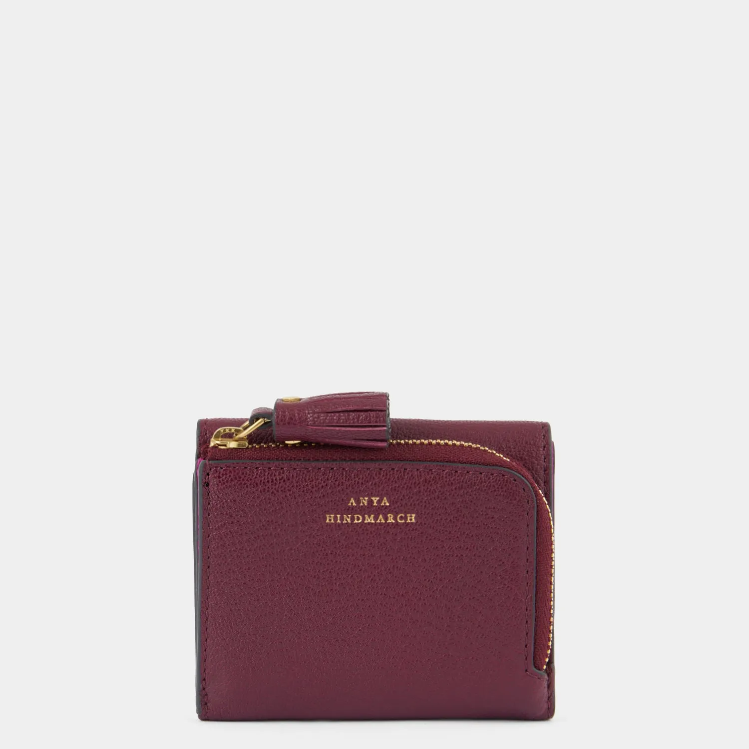 Peeping Eyes Mini Trifold Wallet sold by Anya Hindmarch