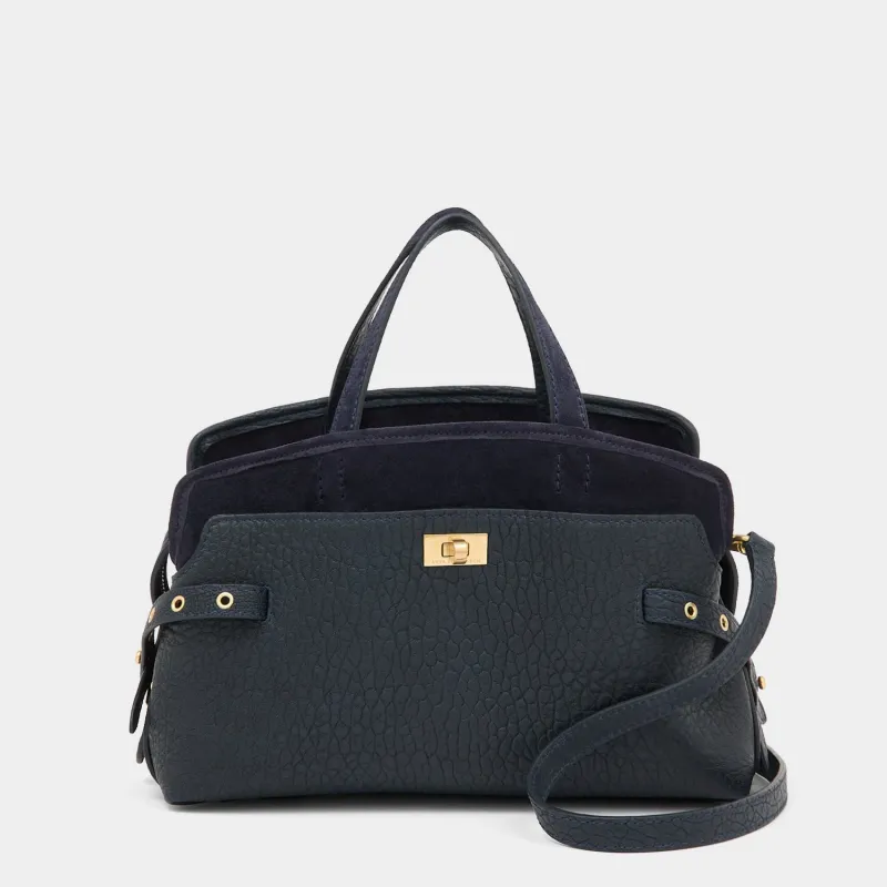 Wilson Eyelet Cross-body made by Anya Hindmarch