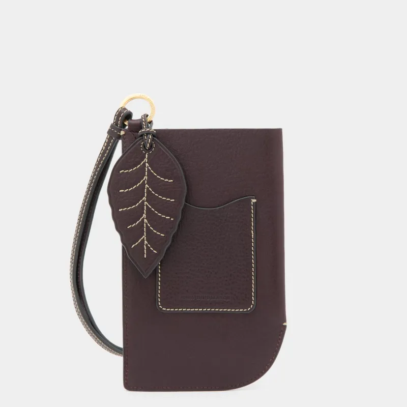Return To Nature Strap Phone Pouch sold by Anya Hindmarch