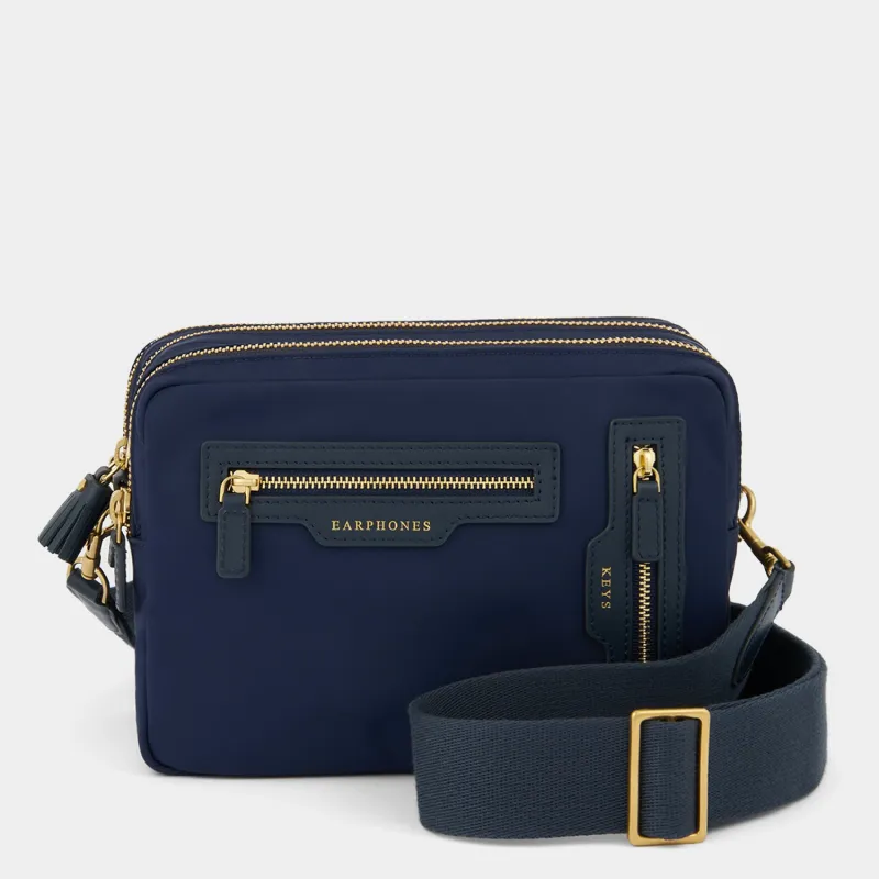 Triple Zip Cross-body sold by Anya Hindmarch