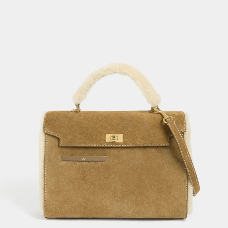 Mortimer Shearling Top Handle made by Anya Hindmarch