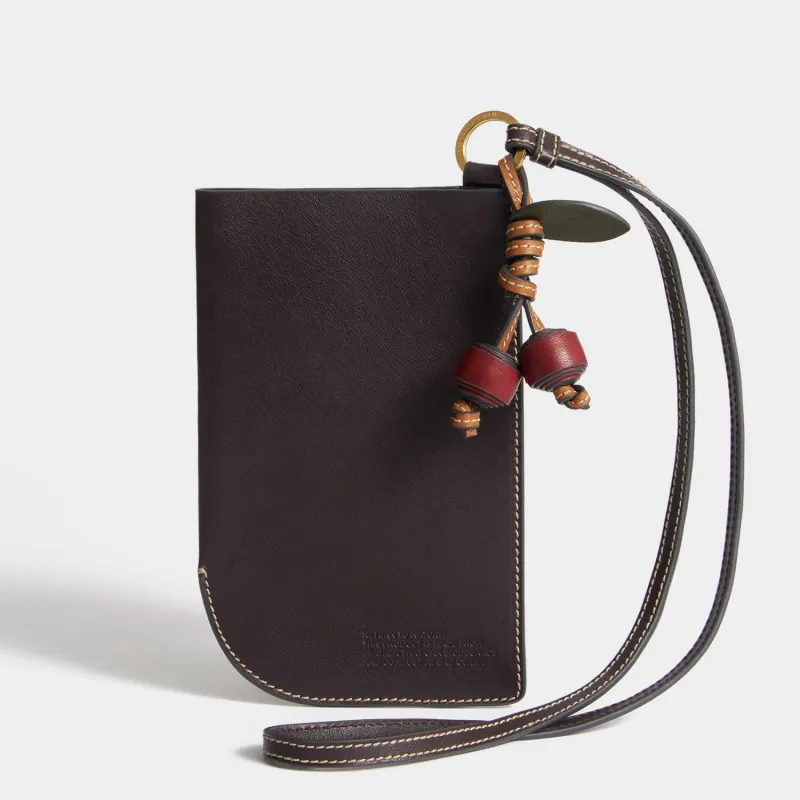Return To Nature Strap Phone Pouch sold by Anya Hindmarch