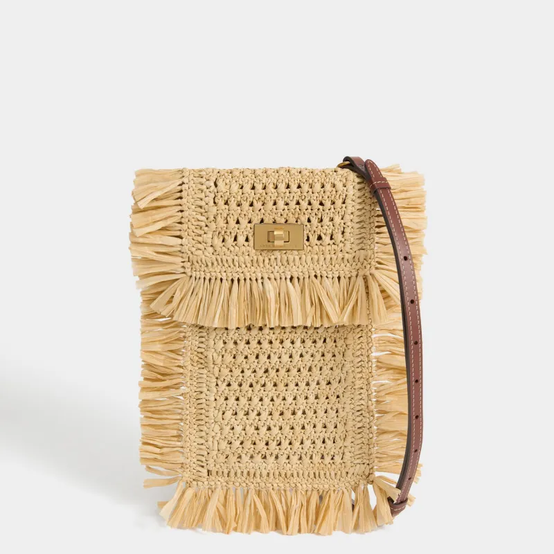 Raffia Cross-body Phone Pouch sold by Anya Hindmarch