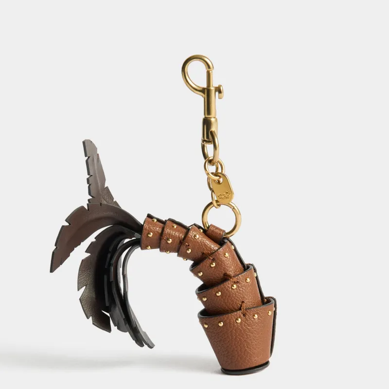 Palm Tree Charm made by Anya Hindmarch