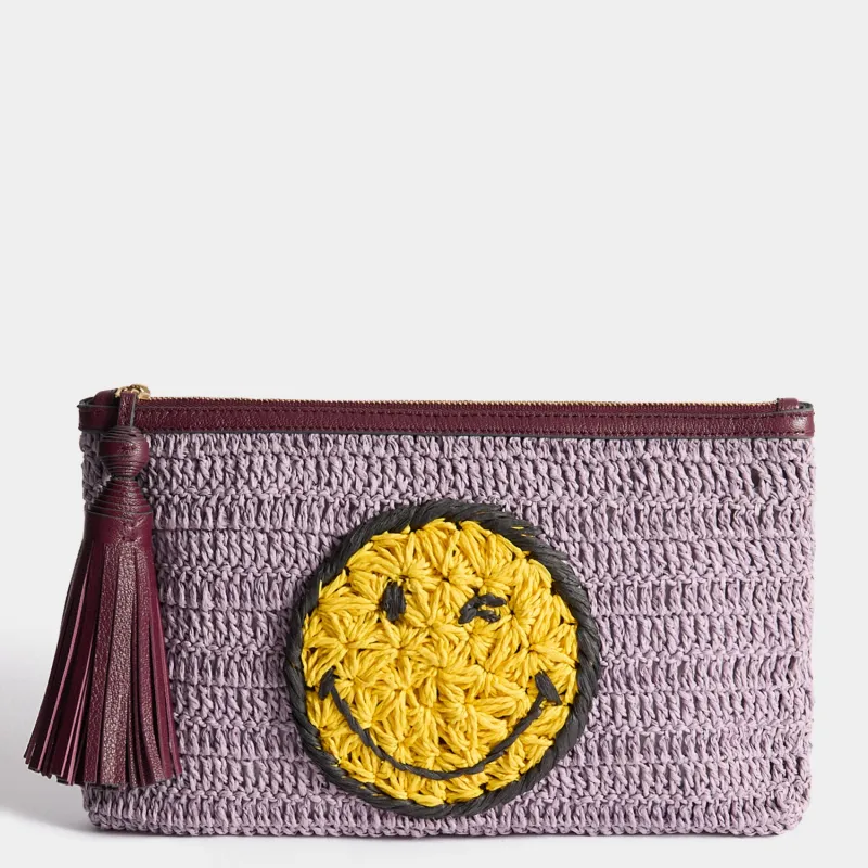 Raffia Wink Pochette made by Anya Hindmarch