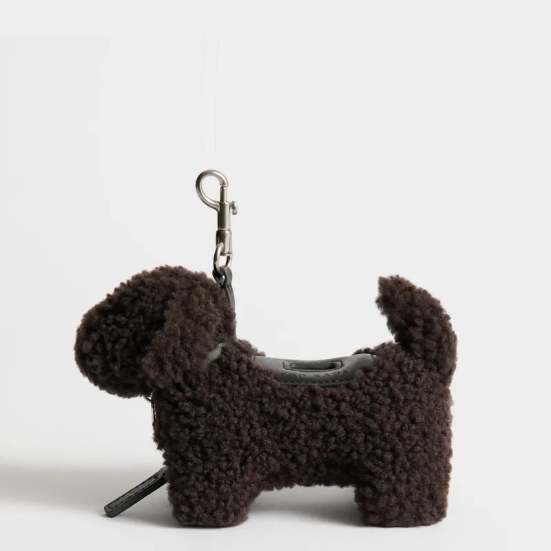 Shearling Dog Poo Bag Charm made by Anya Hindmarch