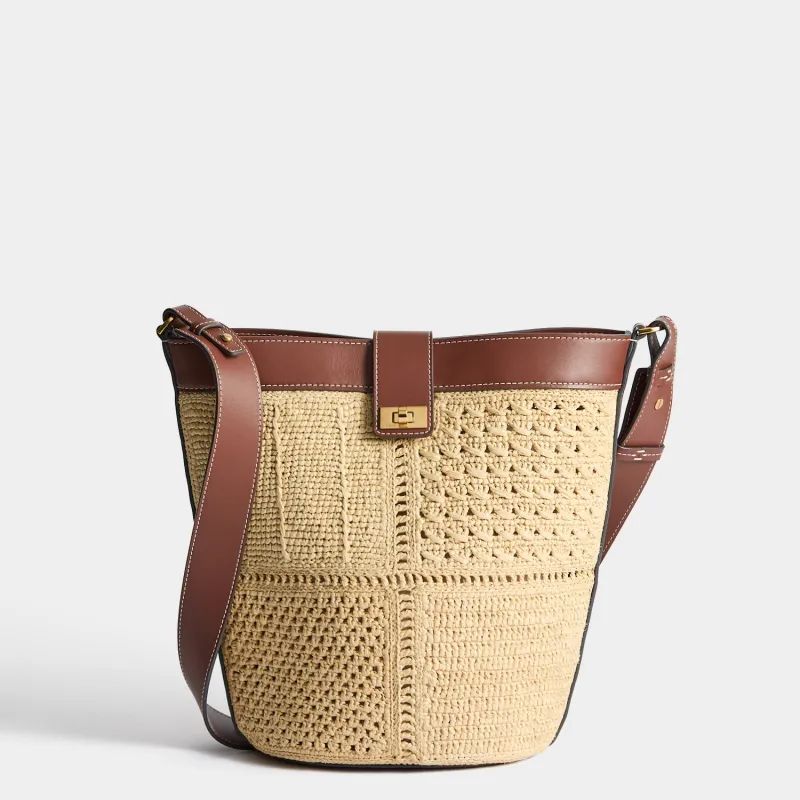 Raffia Patchwork Bucket made by Anya Hindmarch