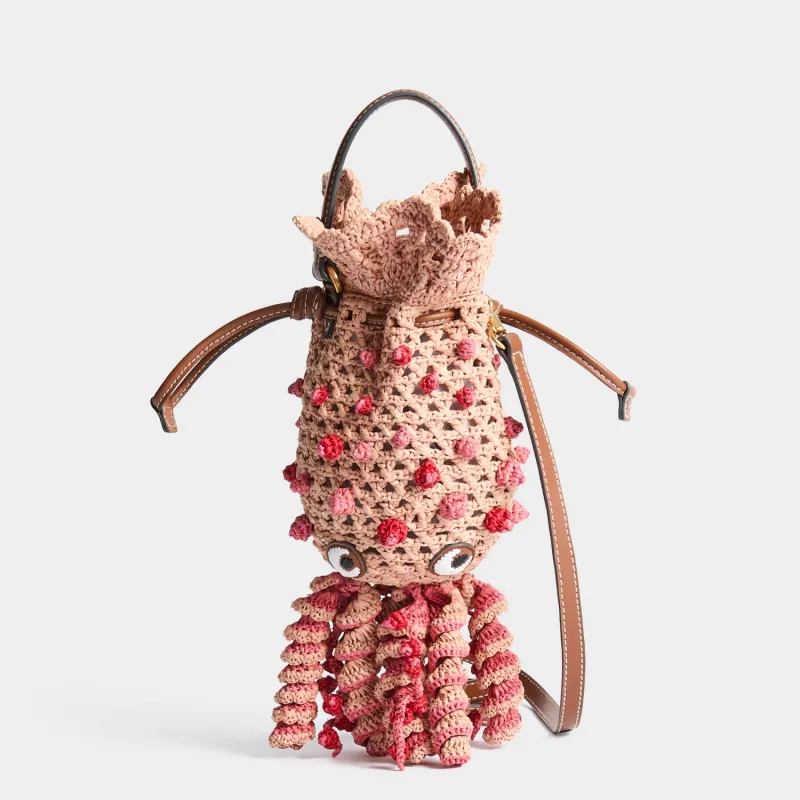 Raffia Squid Cross-body made by Anya Hindmarch