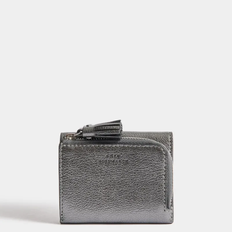 Peeping Eyes Mini Trifold Zip Wallet made by Anya Hindmarch