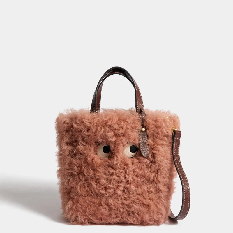 N/S Eyes Shearling Mini Tote made by Anya Hindmarch