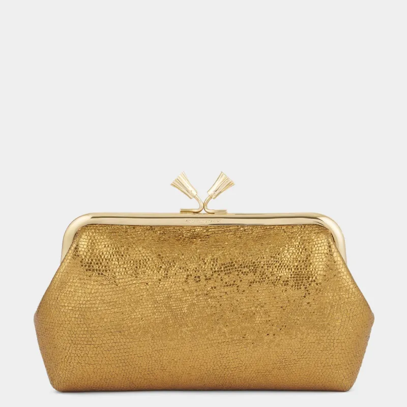 Maud Tassel Clutch sold by Anya Hindmarch