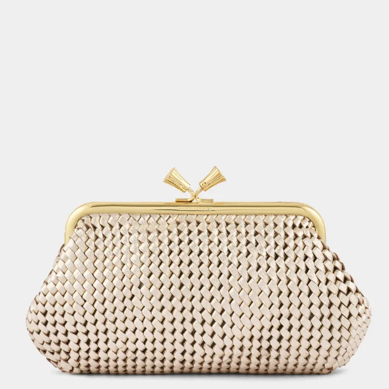 Maud Plaited Tassel Clutch sold by Anya Hindmarch