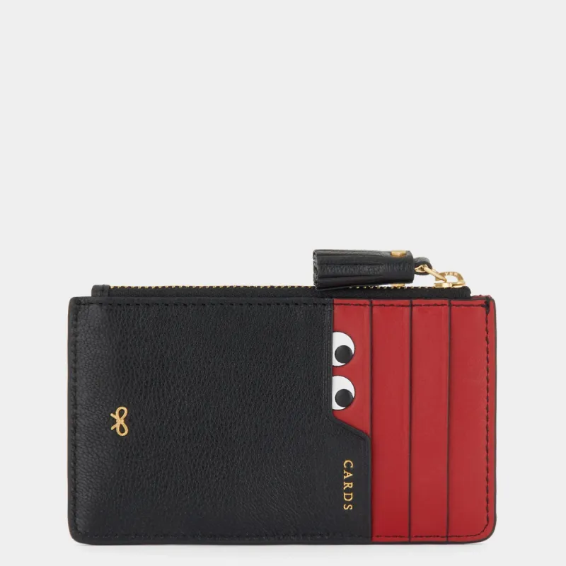 Peeping Eyes Zip Card Case sold by Anya Hindmarch