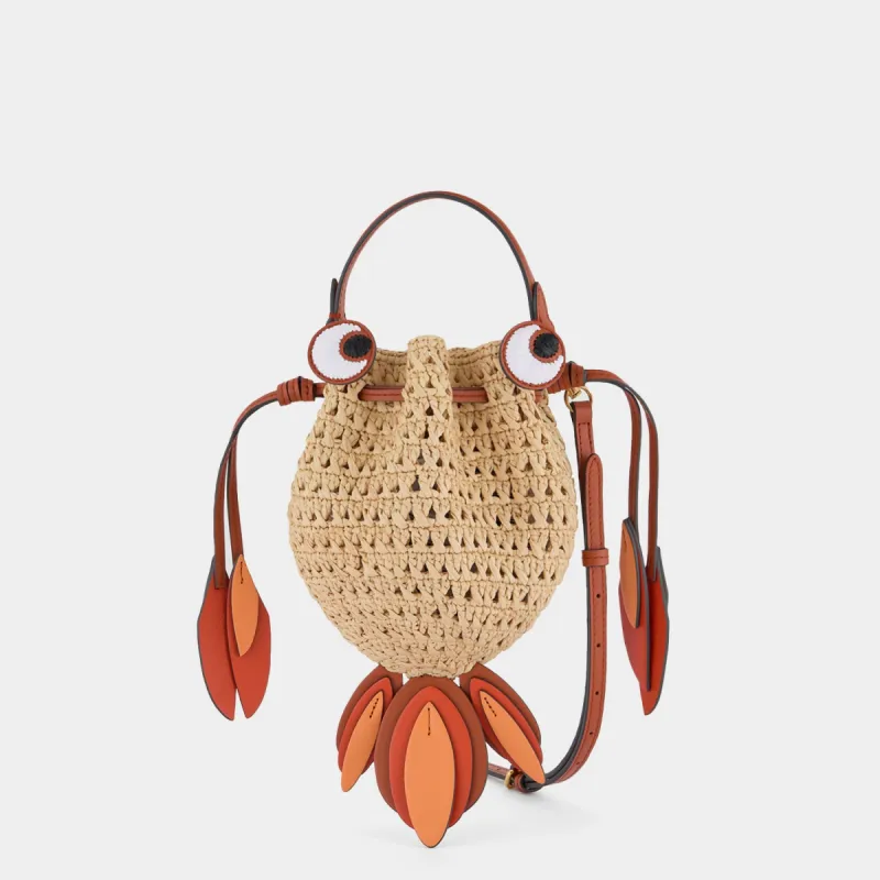 Raffia Goldfish Mini Cross-body made by Anya Hindmarch