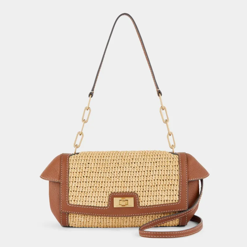Raffia Tube Shoulder Bag made by Anya Hindmarch