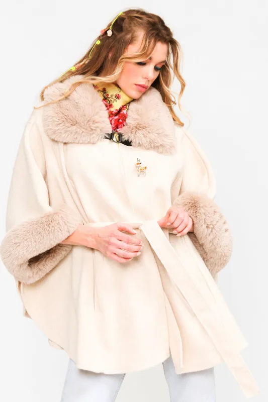 Ice Queen Poncho sold by Aratta