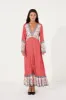 June Teadress in Salsa sold by Arnhem