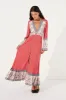 June Teadress in Salsa sold by Arnhem