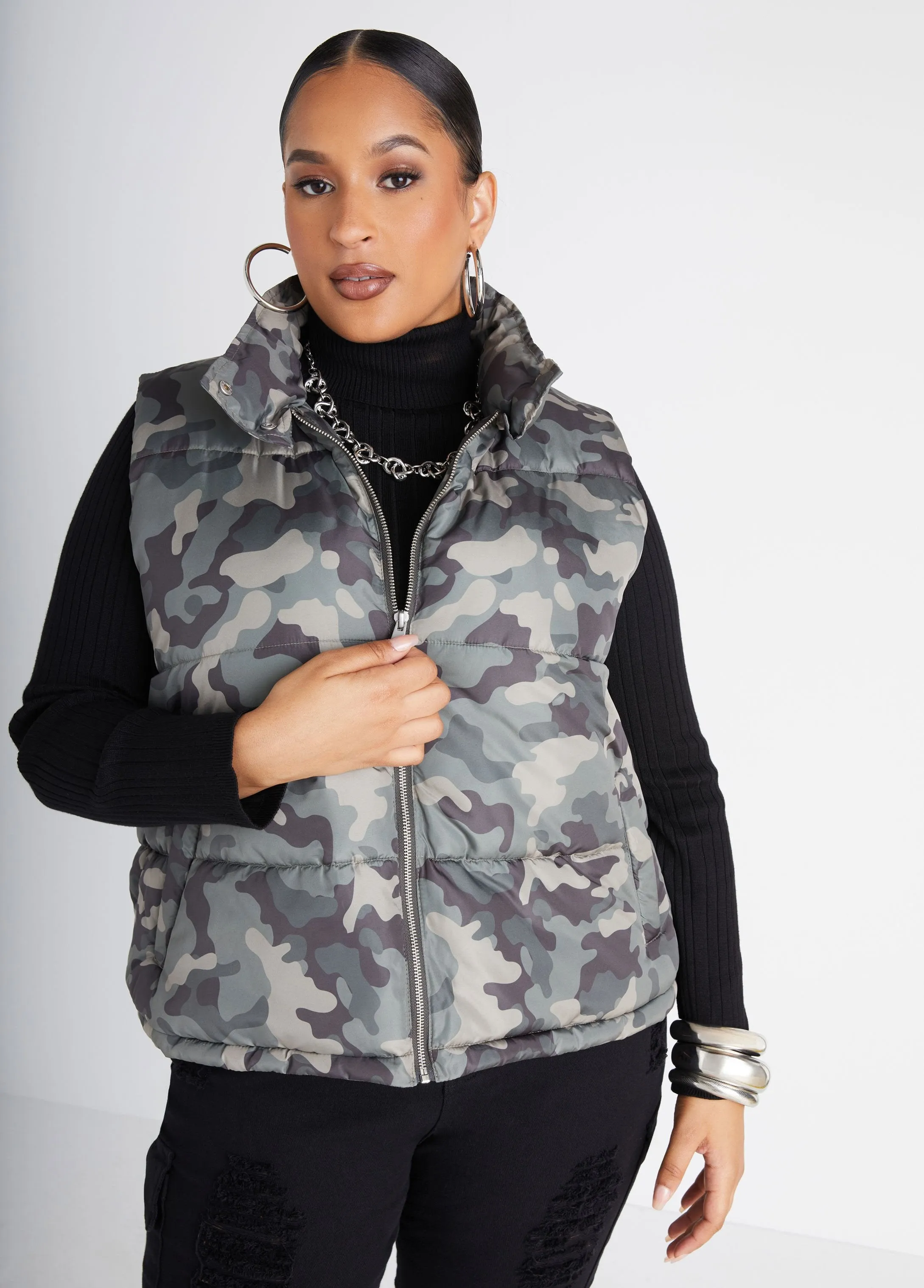 Camo Print Puffer Vest sold by Ashley Stewart