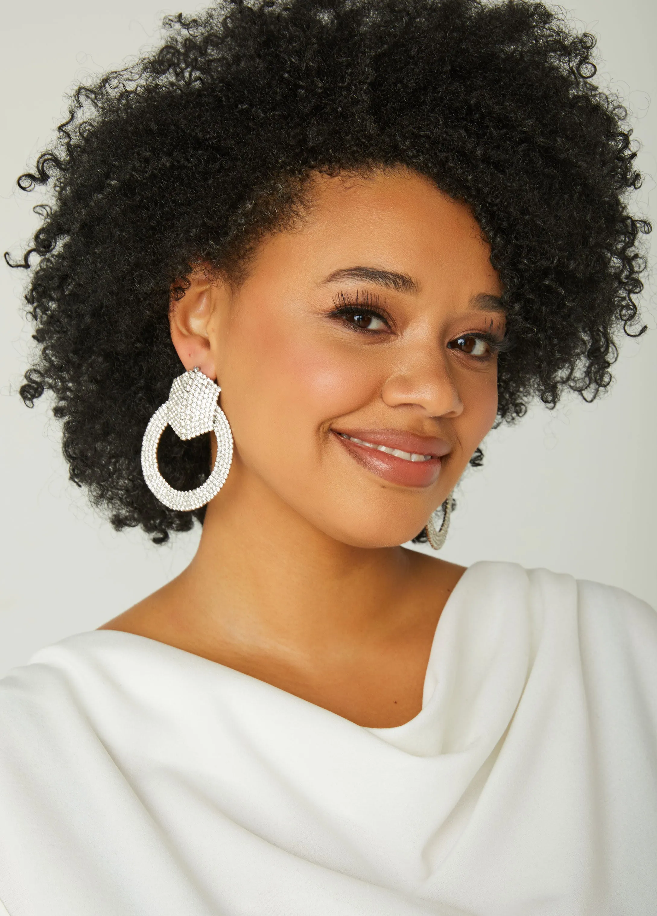 Crystal Doorknocker Earrings sold by Ashley Stewart