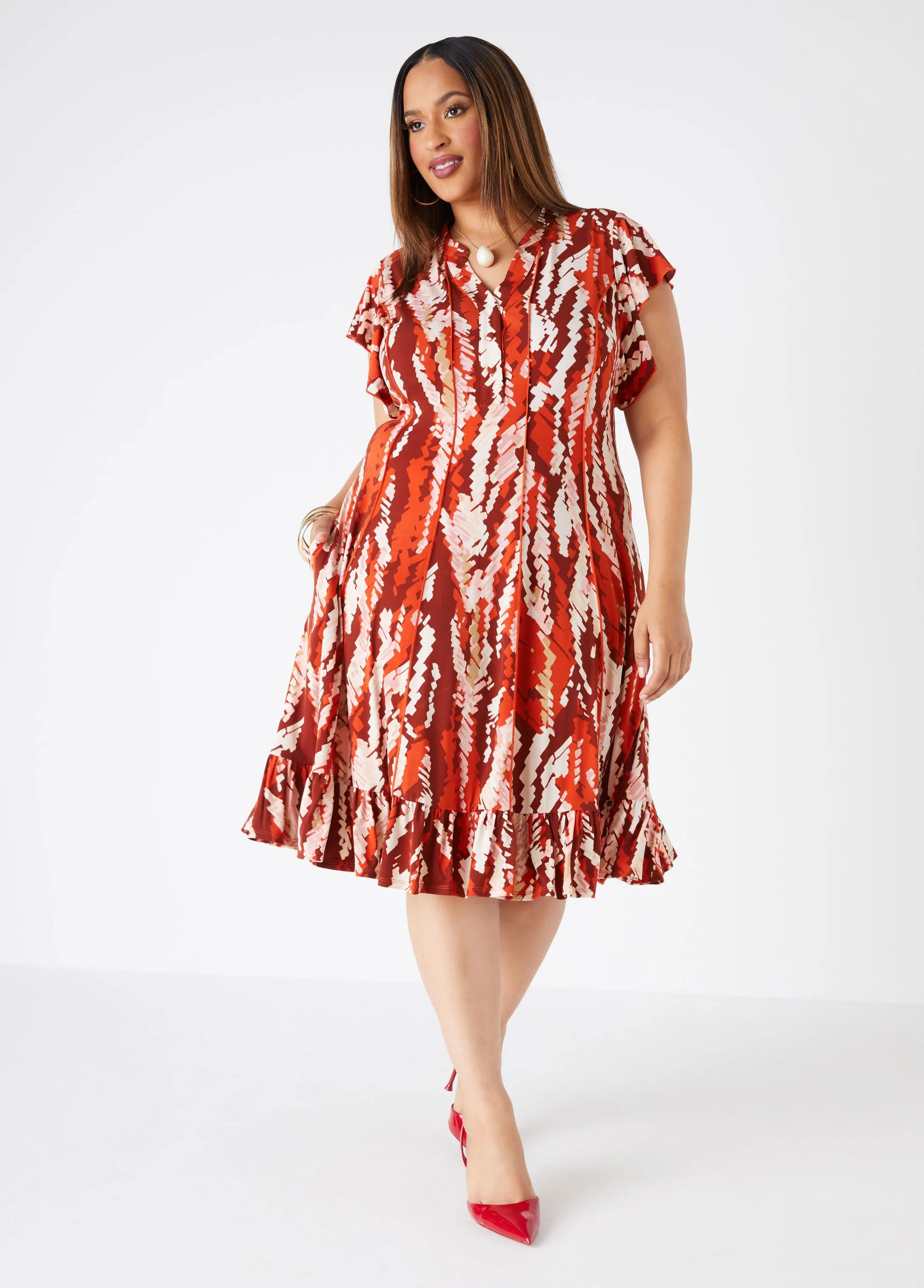 Ruffled Brushstroke Knit Dress sold by Ashley Stewart
