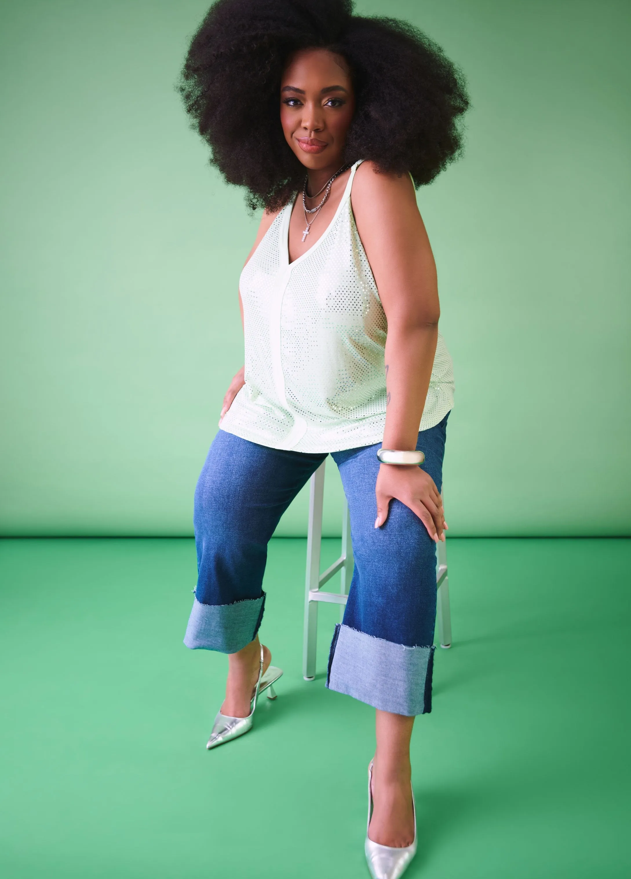 Sequin Embellished Knit Top sold by Ashley Stewart