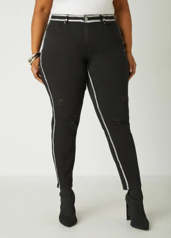 Painted Distressed Skinny Jeans sold by Ashley Stewart