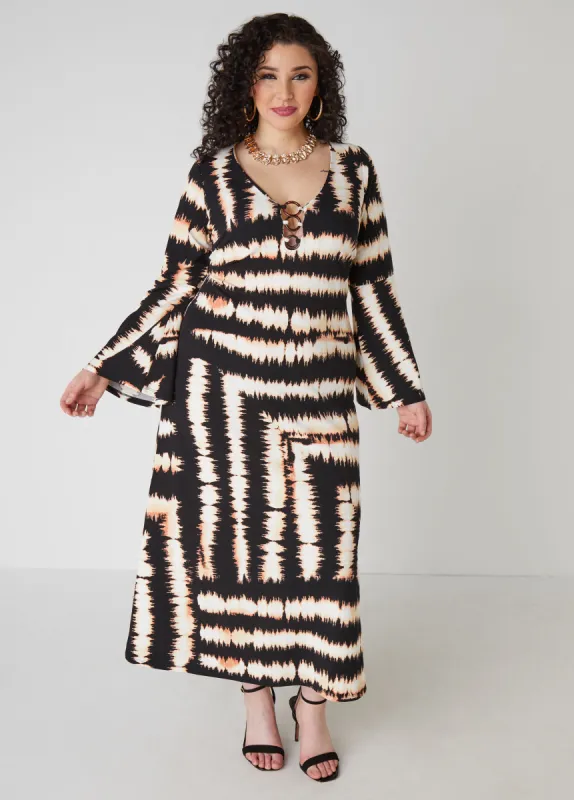 Ring Embellished Printed Dress sold by Ashley Stewart