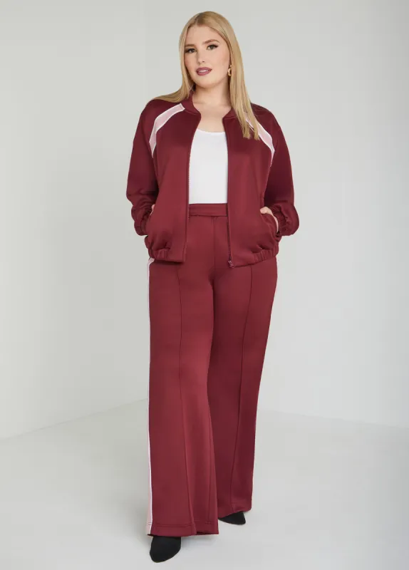 Embroidered Pique Track Pants sold by Ashley Stewart