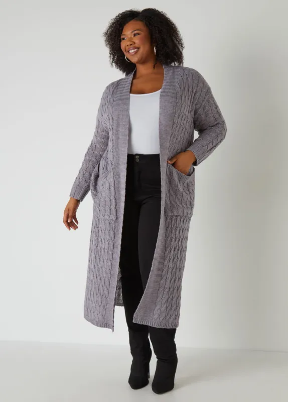 Cable Knit Pocketed Duster sold by Ashley Stewart