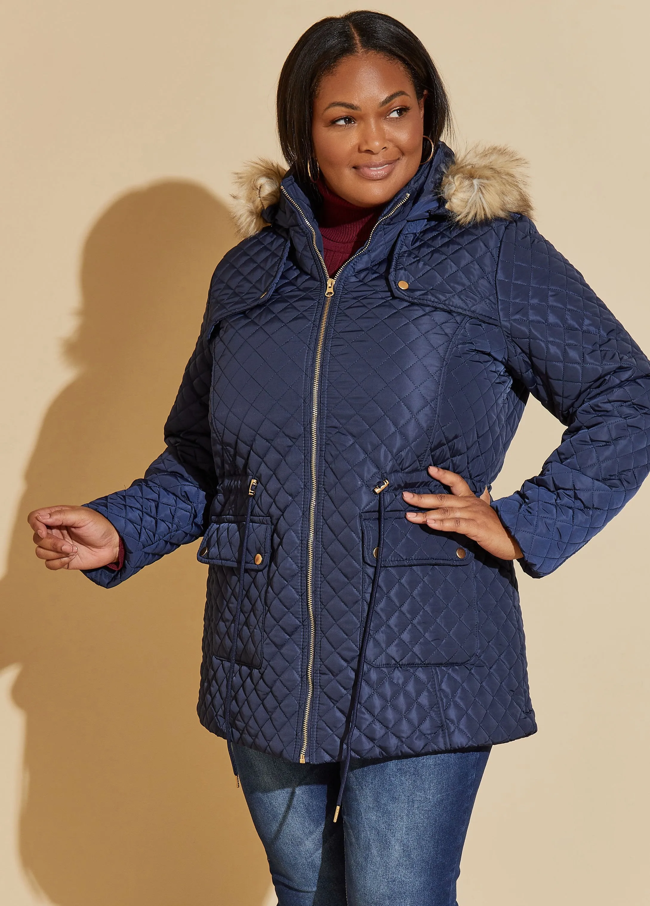 Faux Fur Trimmed Quilted Coat sold by Ashley Stewart
