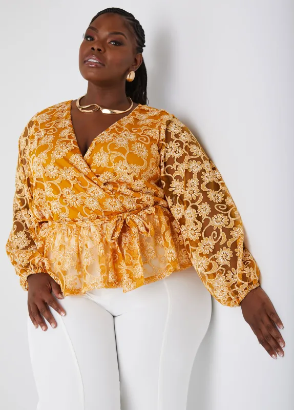 Floral Mesh Faux Wrap Top sold by Ashley Stewart