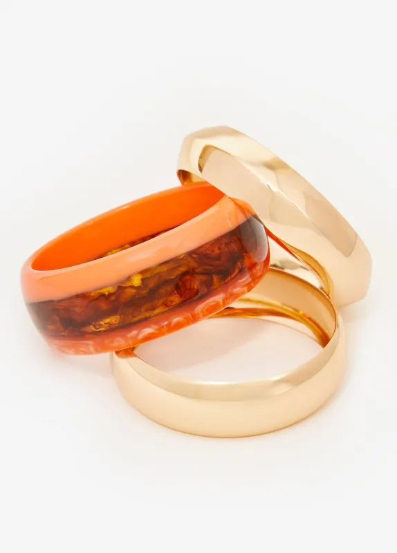 Gold Tone And Resin Bangle Set sold by Ashley Stewart