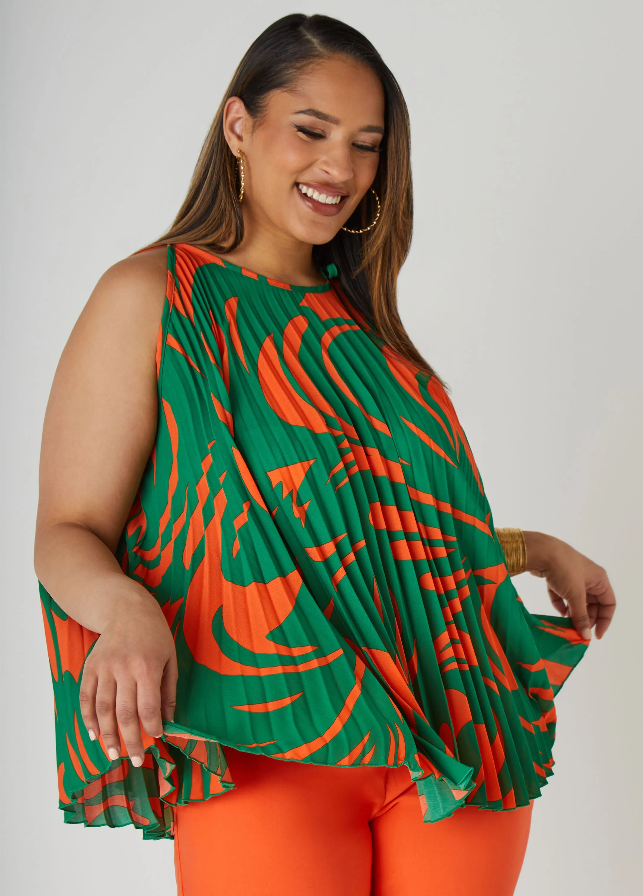Pleated Tropical Print Swing Top sold by Ashley Stewart