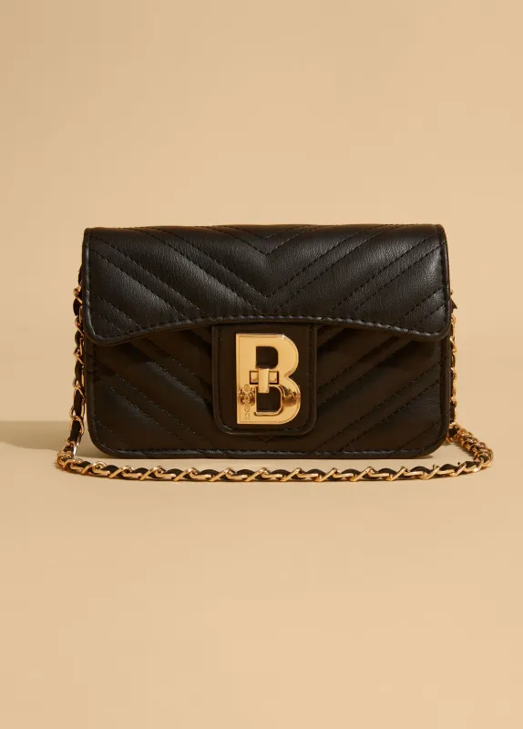 Bebe Rain Quilted Crossbody sold by Ashley Stewart