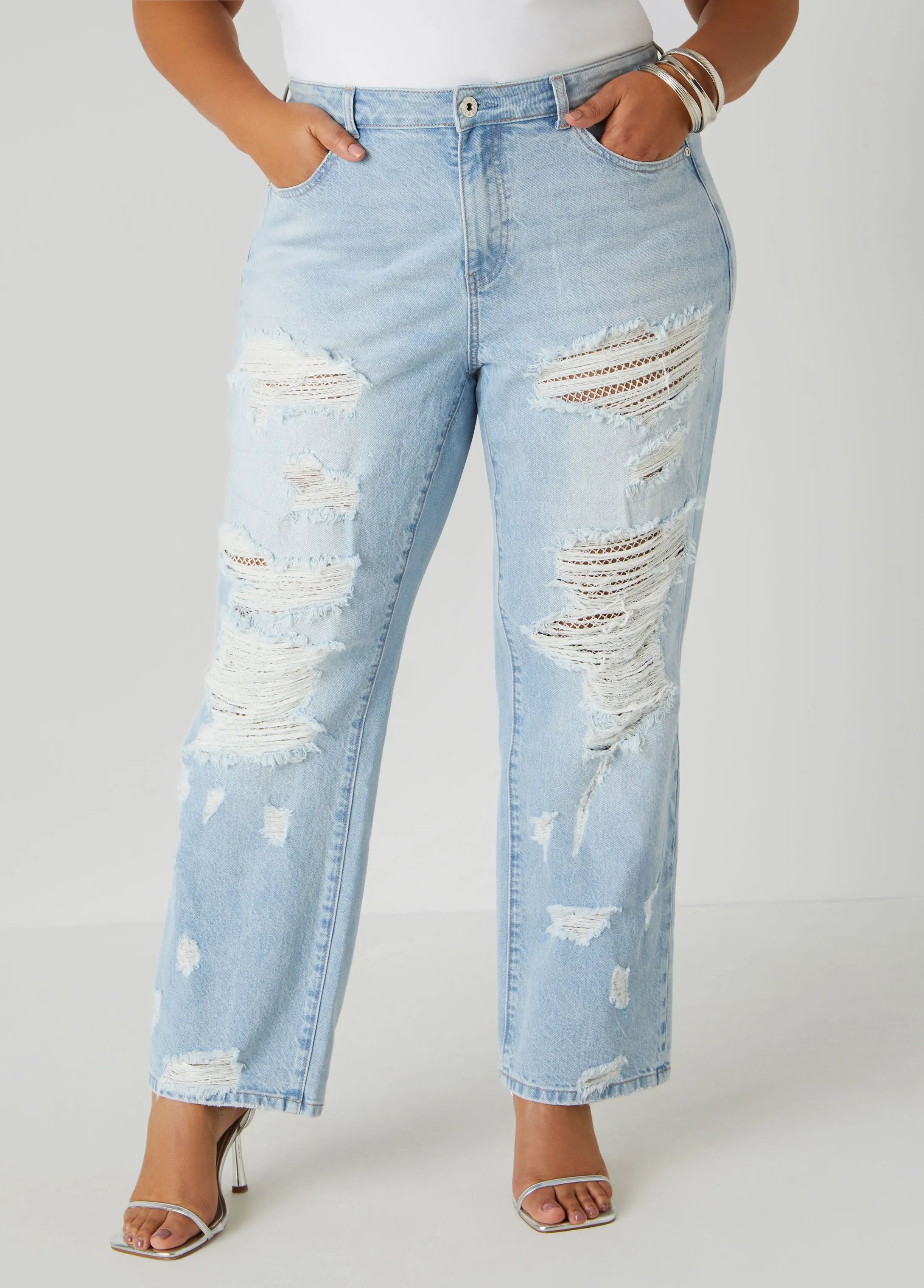 Mesh Paneled Distressed Jeans sold by Ashley Stewart