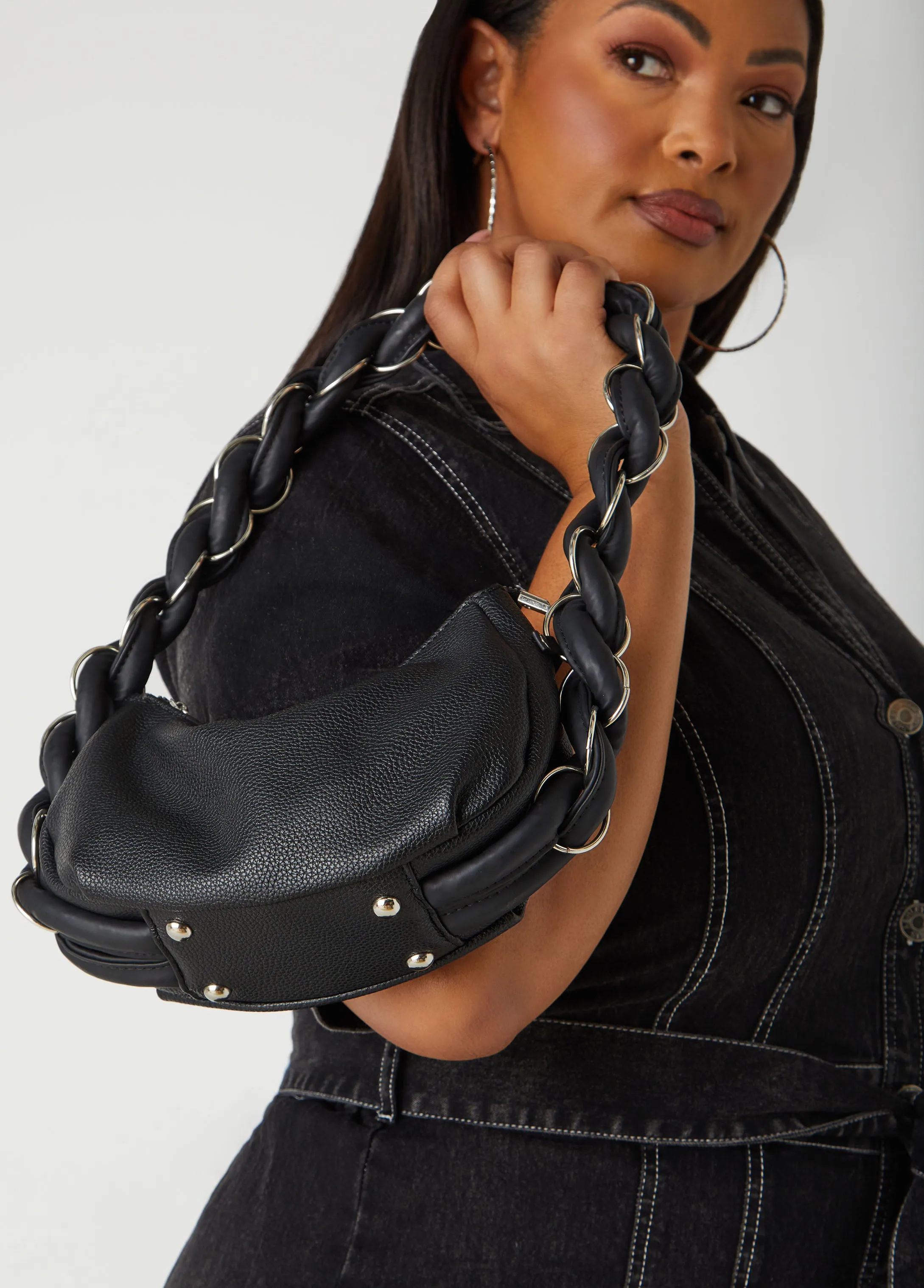 Twisted Pebbled Faux Leather Bag sold by Ashley Stewart